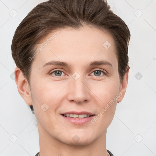 Joyful white young-adult female with short  brown hair and grey eyes