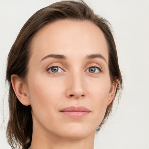 Neutral white young-adult female with medium  brown hair and grey eyes