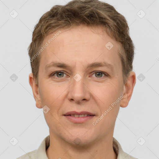 Joyful white adult male with short  brown hair and grey eyes