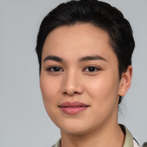 Joyful asian young-adult female with medium  black hair and brown eyes