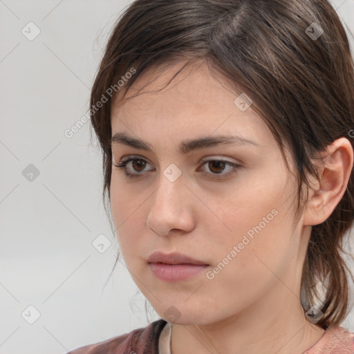 Neutral white young-adult female with medium  brown hair and brown eyes