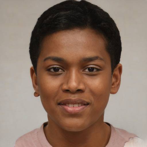 Joyful black young-adult female with short  black hair and brown eyes