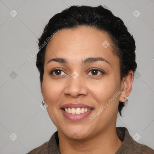 Joyful latino young-adult female with short  black hair and brown eyes