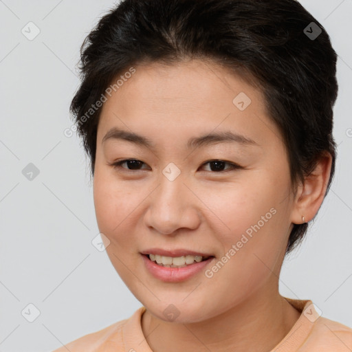 Joyful asian young-adult female with short  brown hair and brown eyes