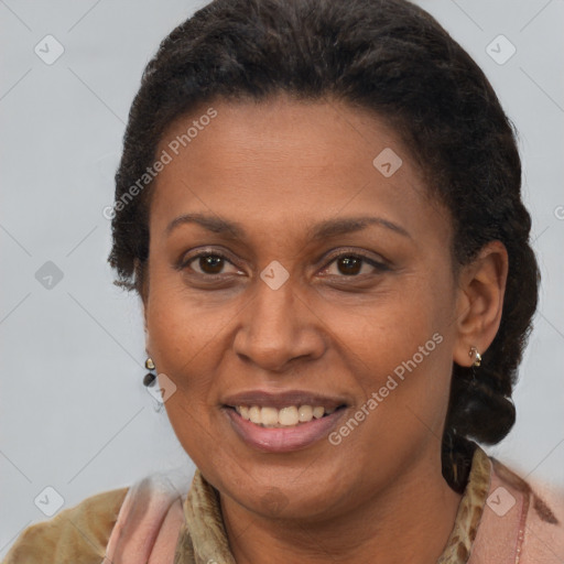 Joyful latino adult female with short  brown hair and brown eyes