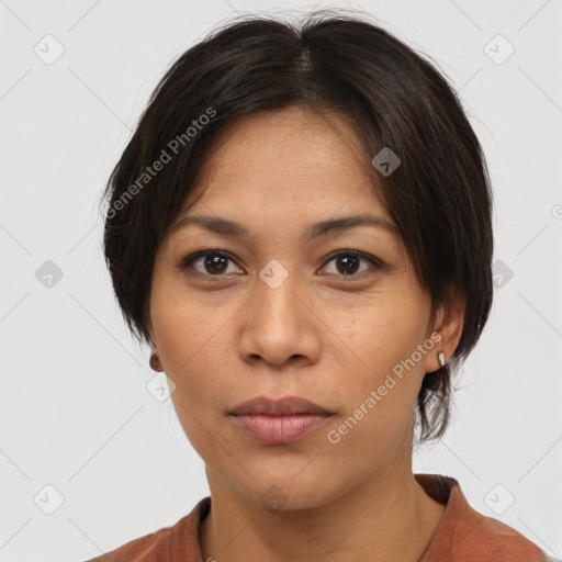 Neutral asian young-adult female with medium  brown hair and brown eyes