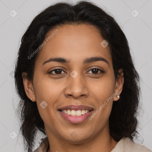 Joyful latino young-adult female with long  brown hair and brown eyes