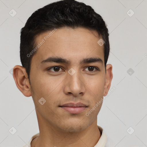 Neutral latino young-adult male with short  brown hair and brown eyes