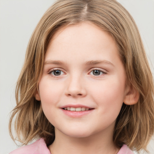 Joyful white child female with medium  brown hair and grey eyes