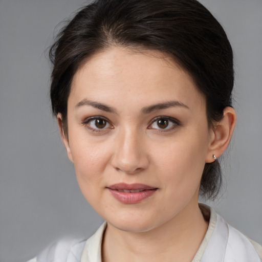 Joyful white young-adult female with medium  brown hair and brown eyes