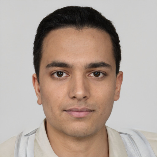 Neutral white young-adult male with short  black hair and brown eyes
