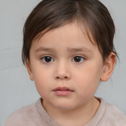 Neutral white child female with medium  brown hair and brown eyes