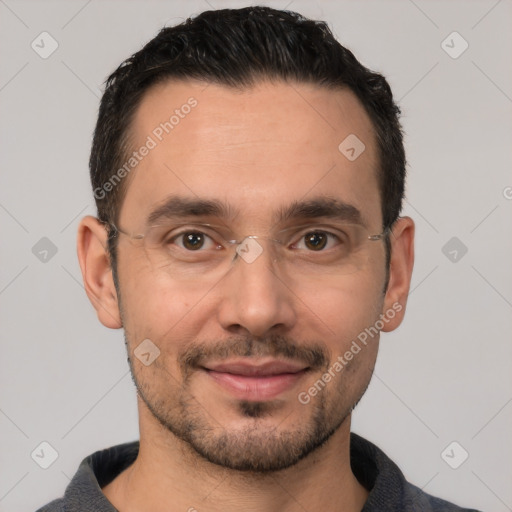 Joyful white young-adult male with short  black hair and brown eyes