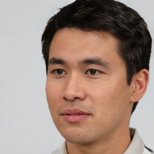 Neutral asian young-adult male with short  black hair and brown eyes