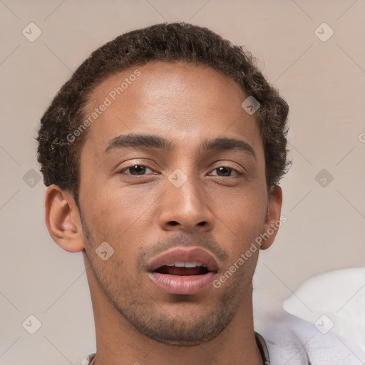 Neutral white young-adult male with short  brown hair and brown eyes