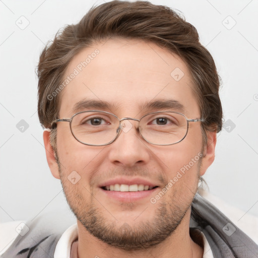 Joyful white adult male with short  brown hair and brown eyes