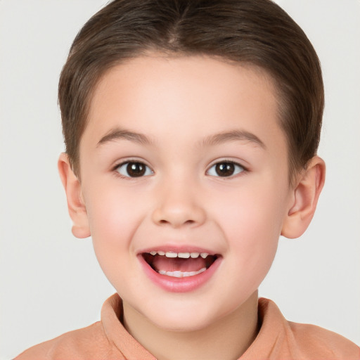 Joyful white child female with short  brown hair and brown eyes