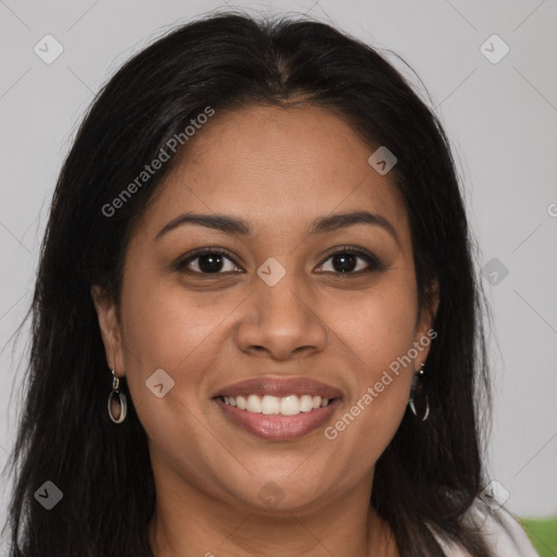 Joyful latino young-adult female with long  brown hair and brown eyes