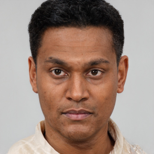 Neutral latino adult male with short  black hair and brown eyes