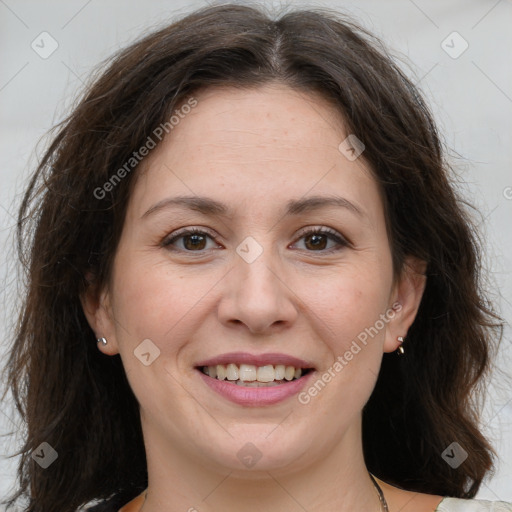 Joyful white adult female with medium  brown hair and brown eyes