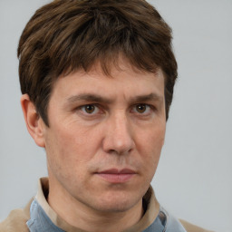 Neutral white adult male with short  brown hair and brown eyes