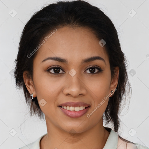 Joyful latino young-adult female with medium  brown hair and brown eyes