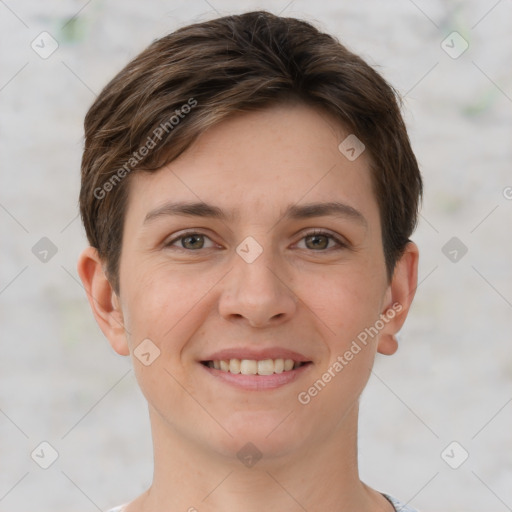 Joyful white young-adult female with short  brown hair and grey eyes