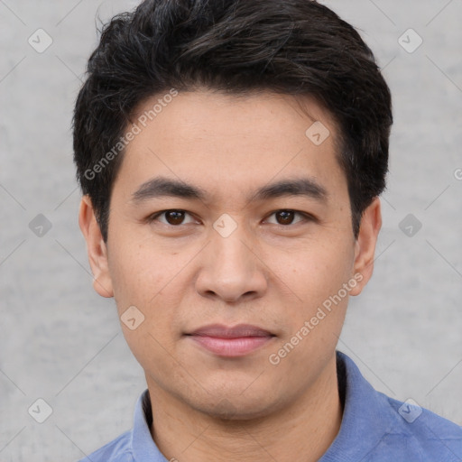 Joyful white young-adult male with short  black hair and brown eyes