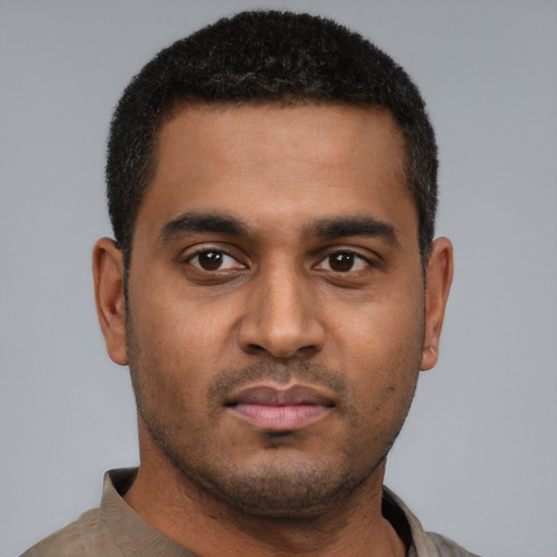 Neutral black young-adult male with short  brown hair and brown eyes