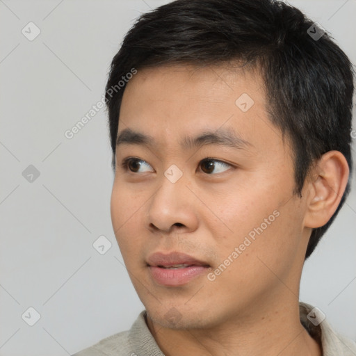 Neutral asian young-adult male with short  black hair and brown eyes