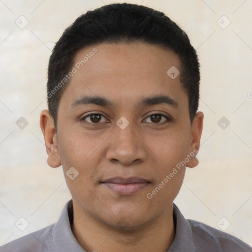Joyful latino young-adult male with short  black hair and brown eyes