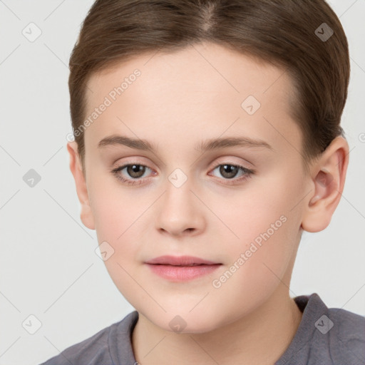 Joyful white child female with short  brown hair and brown eyes