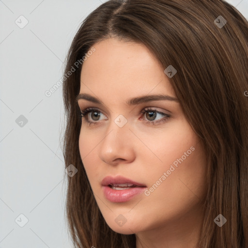 Neutral white young-adult female with long  brown hair and brown eyes