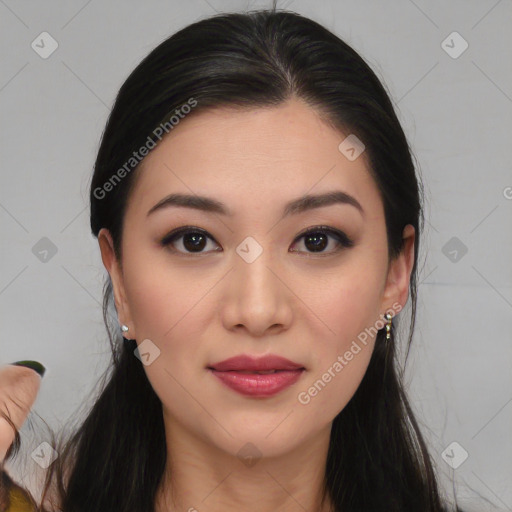 Joyful asian young-adult female with long  brown hair and brown eyes