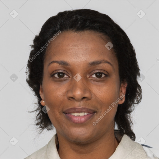 Joyful black adult female with medium  black hair and brown eyes