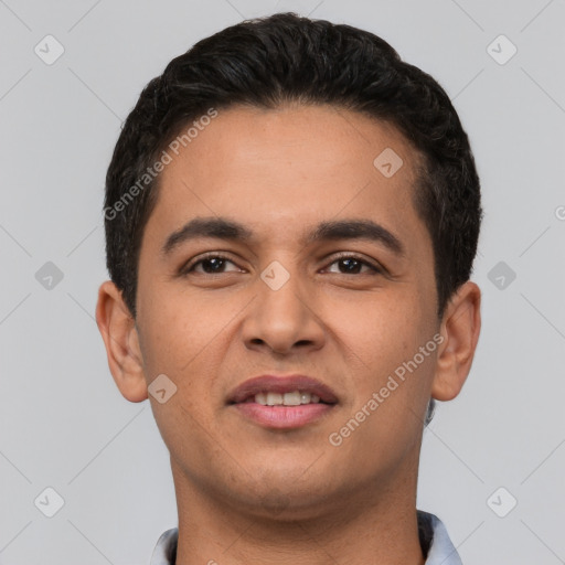 Joyful white young-adult male with short  black hair and brown eyes