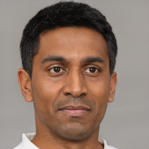 Neutral black adult male with short  black hair and brown eyes