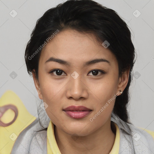 Joyful asian young-adult female with medium  black hair and brown eyes