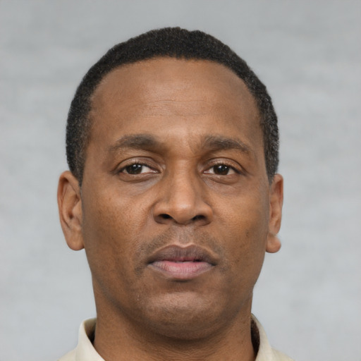Neutral black young-adult male with short  brown hair and brown eyes