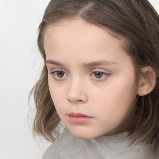 Neutral white child female with medium  brown hair and brown eyes