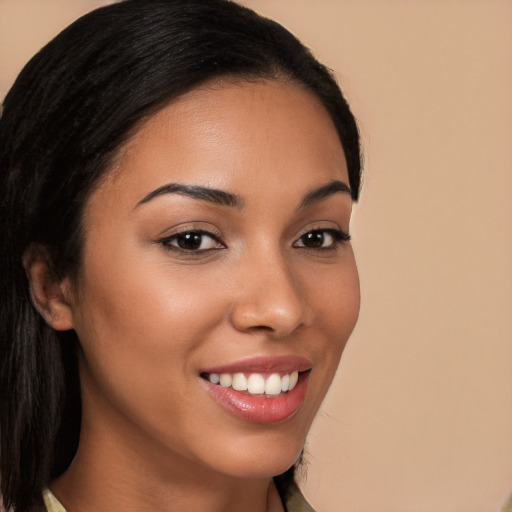 Joyful latino young-adult female with long  brown hair and brown eyes