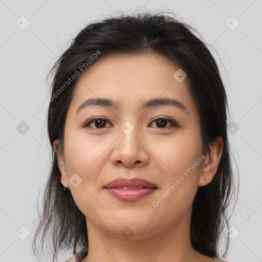 Joyful asian young-adult female with medium  brown hair and brown eyes