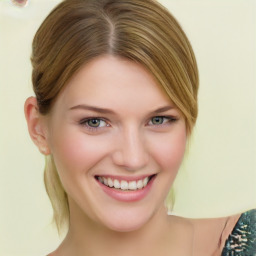 Joyful white young-adult female with medium  brown hair and green eyes