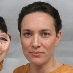 Joyful white adult female with short  brown hair and brown eyes