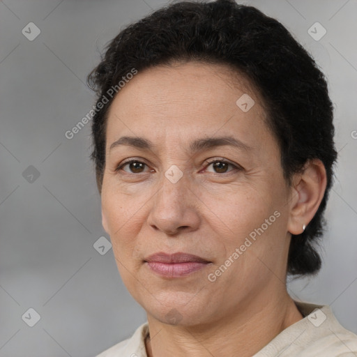 Joyful white adult female with short  brown hair and brown eyes