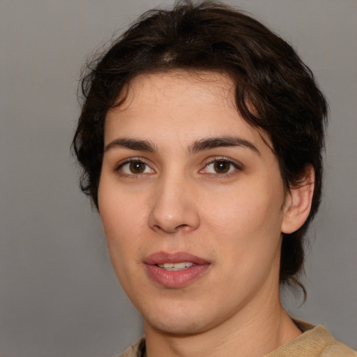 Joyful white young-adult female with medium  brown hair and brown eyes