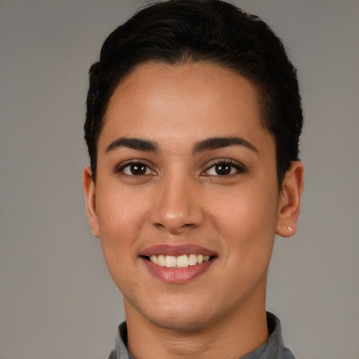 Joyful white young-adult female with short  brown hair and brown eyes