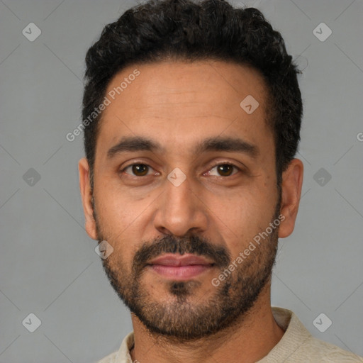 Neutral latino young-adult male with short  black hair and brown eyes