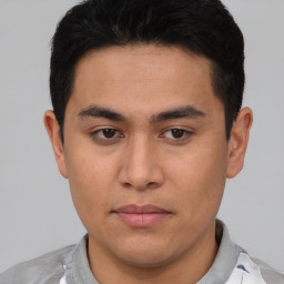 Neutral asian young-adult male with short  brown hair and brown eyes