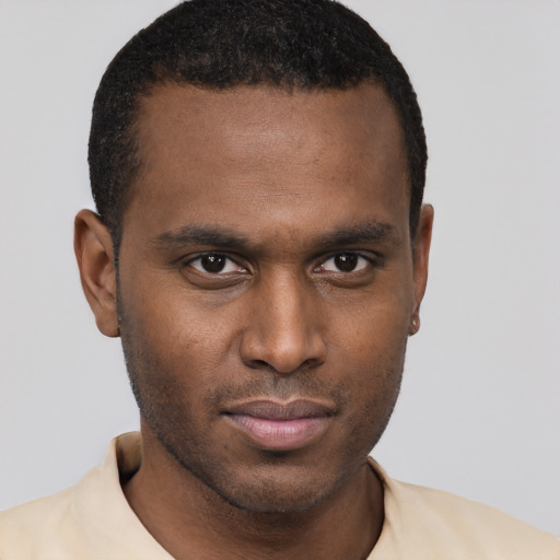 Neutral black young-adult male with short  brown hair and brown eyes